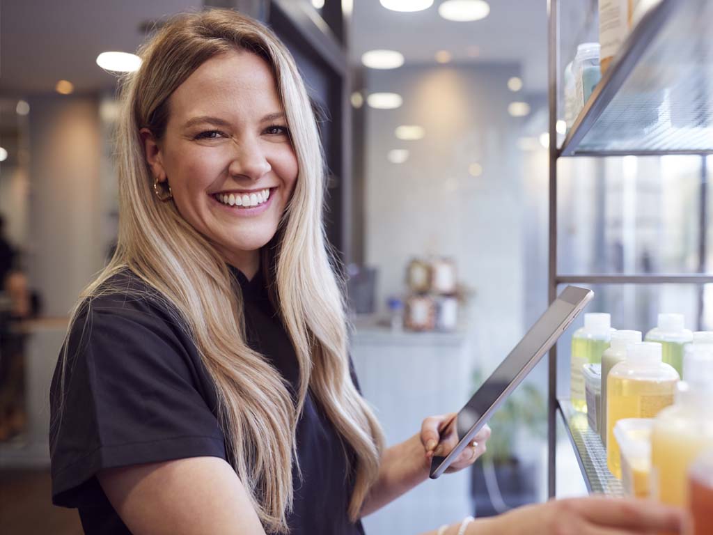 Employee working with tablet in hand